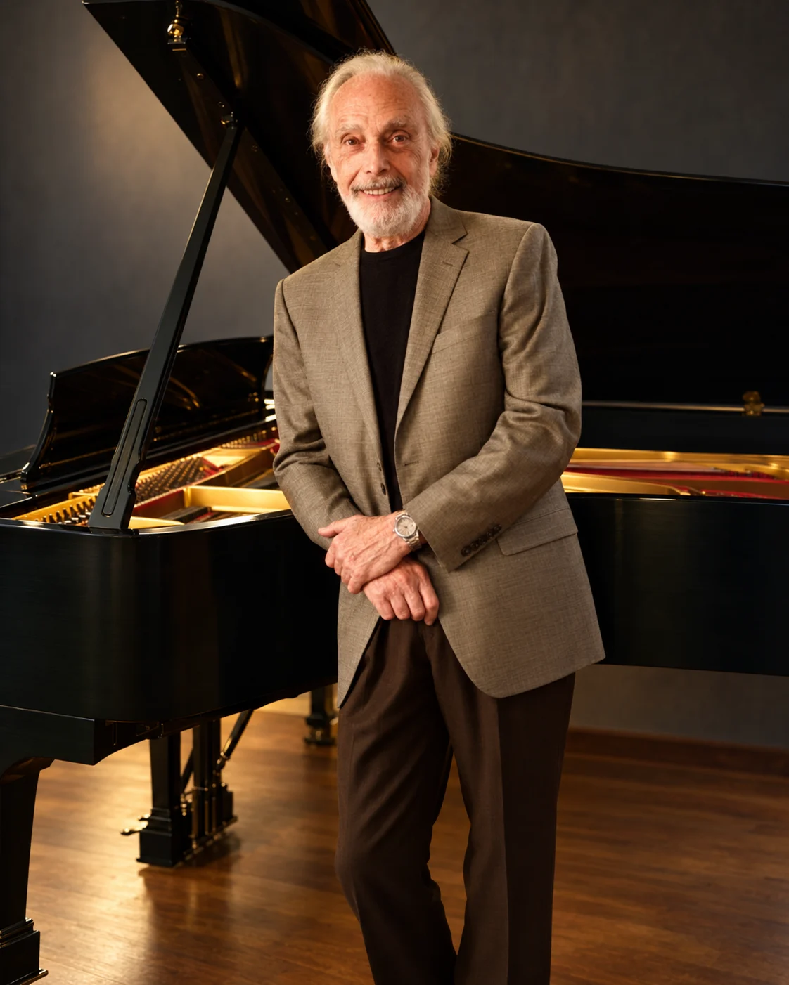 Sanford Blaze standing beside a grand piano